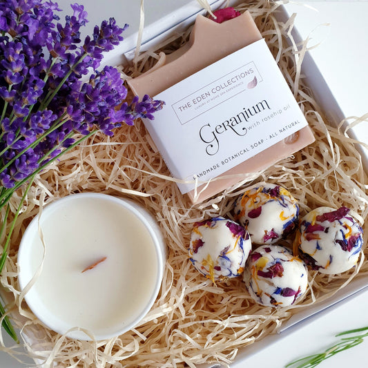 Luxury Gift Set by The Eden Collections with candle, artisan soap, bath creamers in a deluxe gift box. 