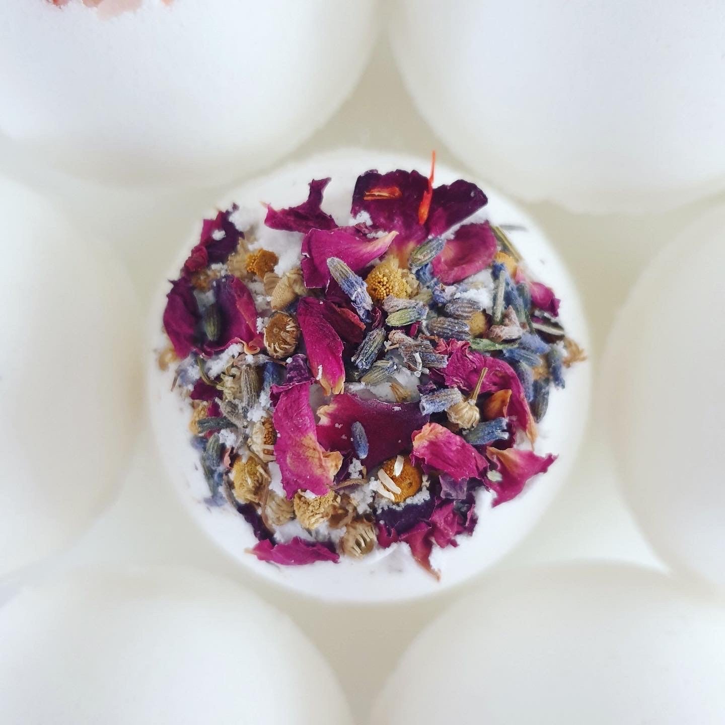 Sweet Dreams, calming Secret Bath Bomb. Decorated with beautiful botanicals, enriched with organic butters, this aromatherapy bath bomb is made by The Eden Collections