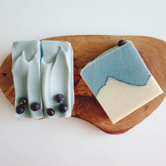 Bergamot and Lavender handmade all natural soap from The Eden Collections. Blue indigo, white kaolin and juniper berry decoration.