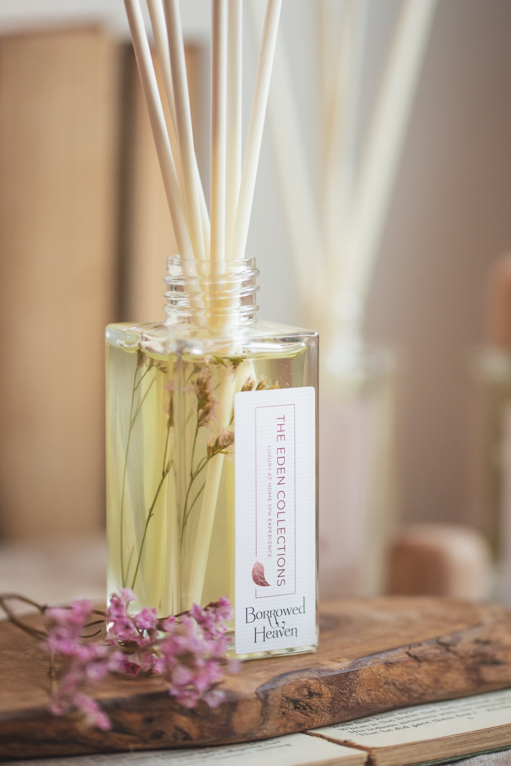 Beautiful essential oil reed diffuser with botanicals inside. These healthy, aromatherapy reed diffusers are hand poured by The Eden Collections in Wales.