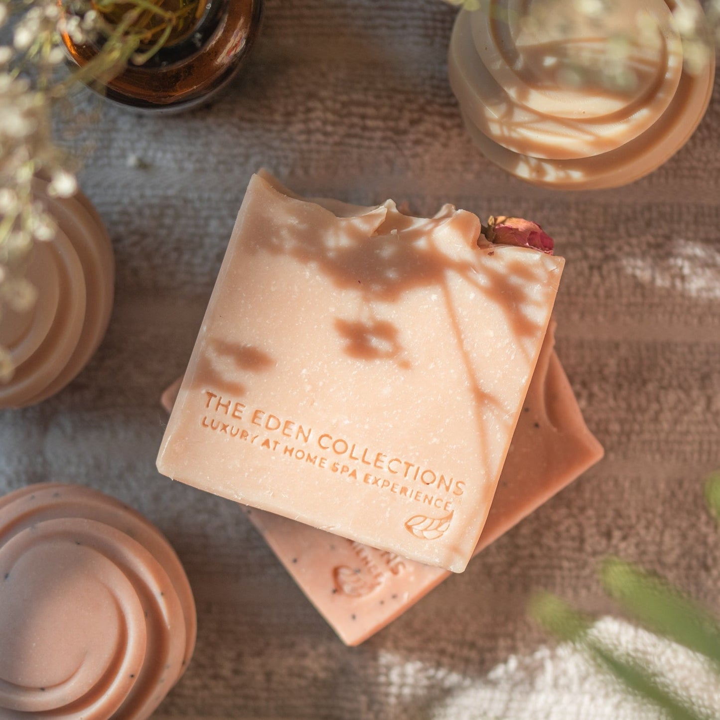 Geranium soap with rosehip oil, decorated with dried rose buds. This all natural soap bar is handmade in small batched by the Eden Collections