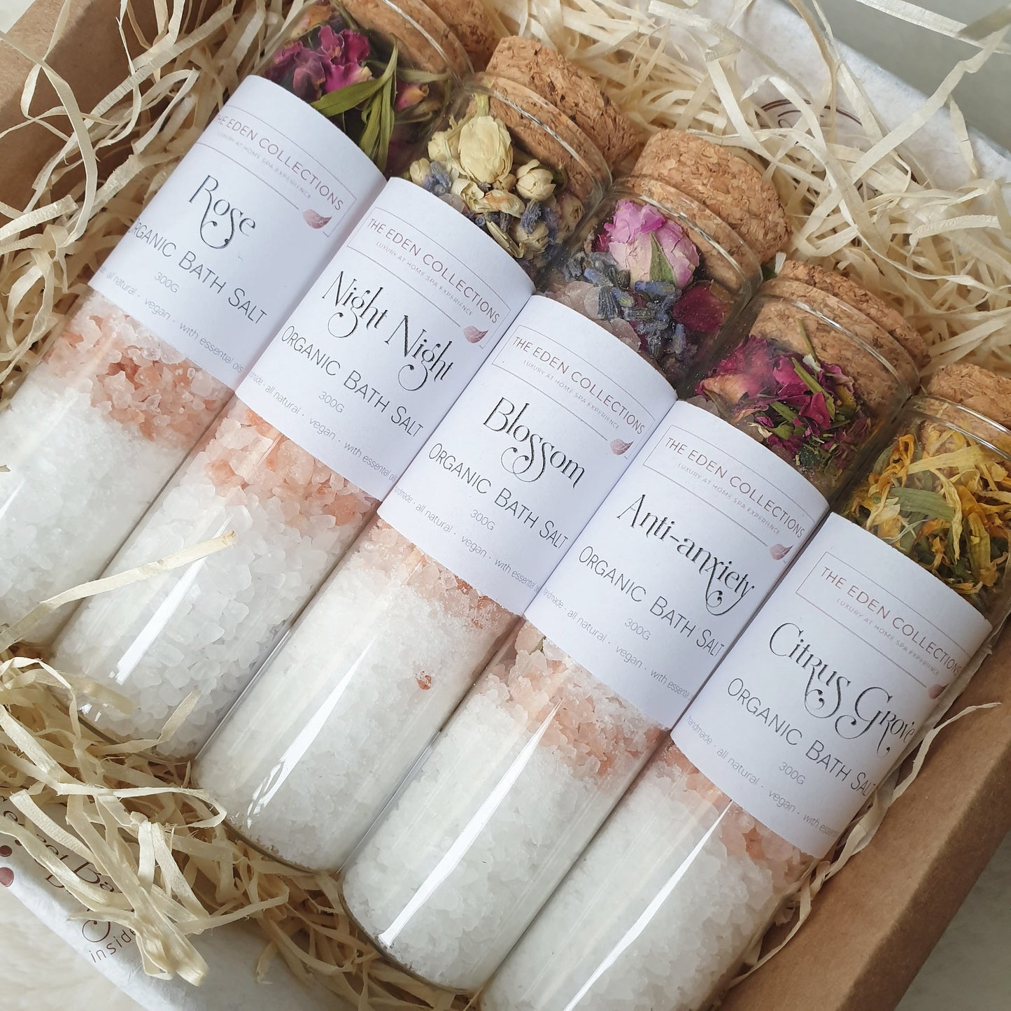 The Eden Collections range of organic epsom, dead sea and pink himalayan bath salts, featuring Rose, Night Night, Blossom, Anti-anxiety, and Citrus Grove.