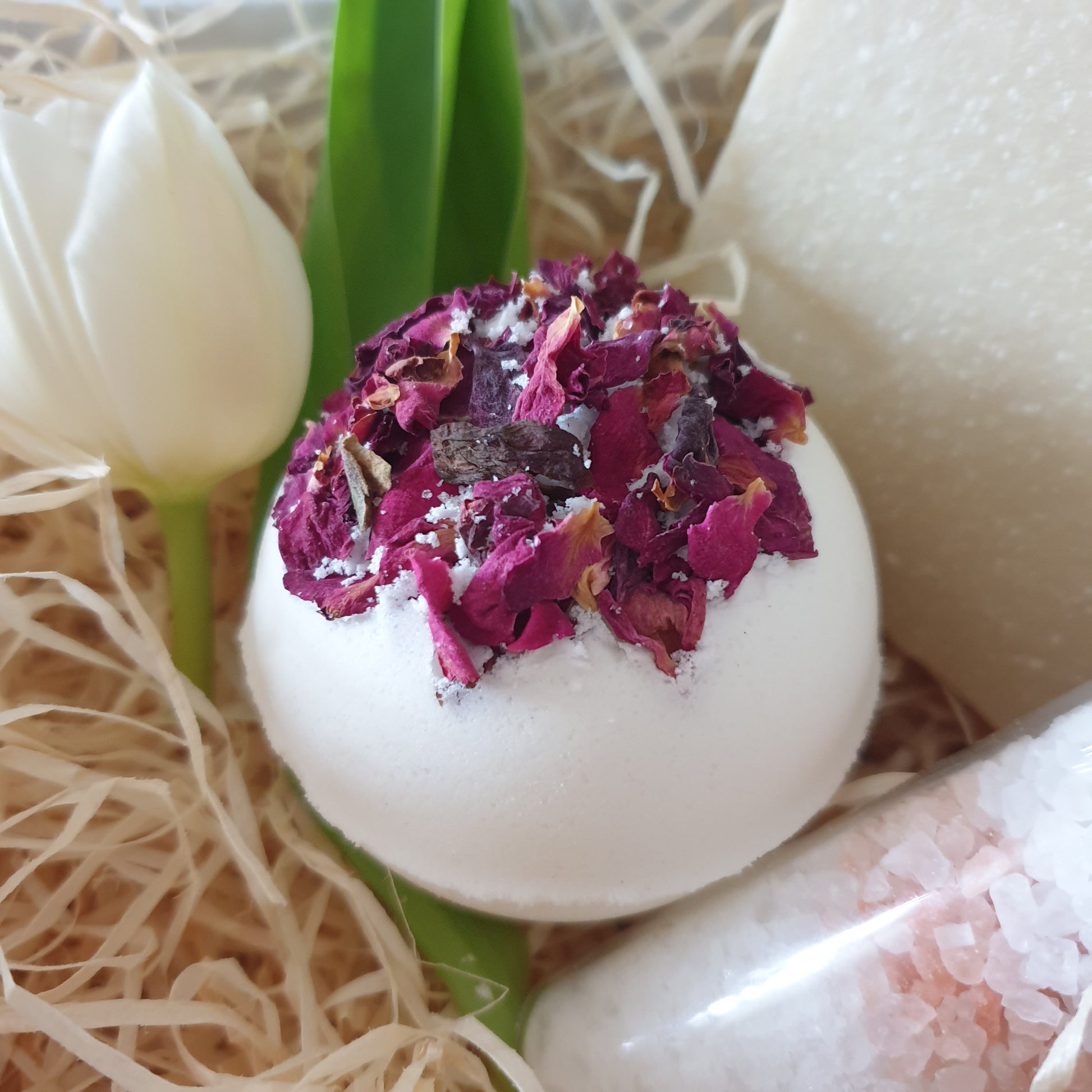 Rose and Sandalwood Secret Bath Bomb along with other products by The Eden Collections.